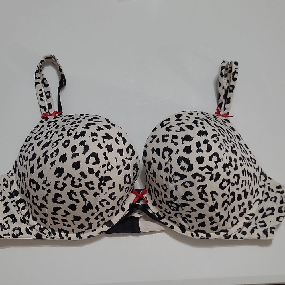 Cacique Black & White Leopard/Dalmatian Print Bra with Red Bow Accents size 46C